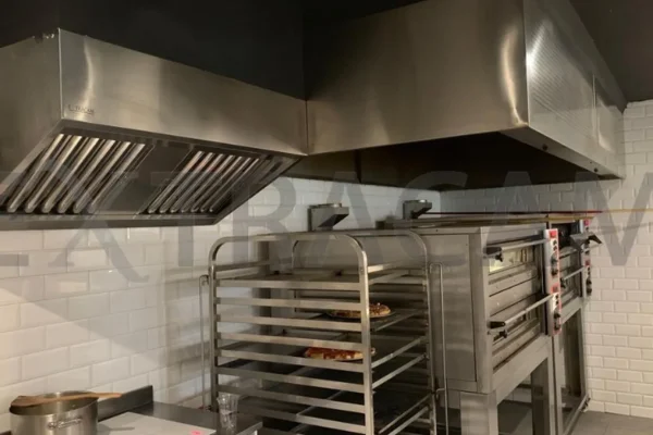 Campana compensada de alta captura con faldón frontal extendido